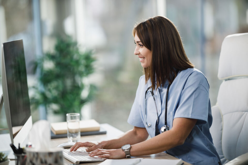 doctor entering recording in the electronic health records (EHR)